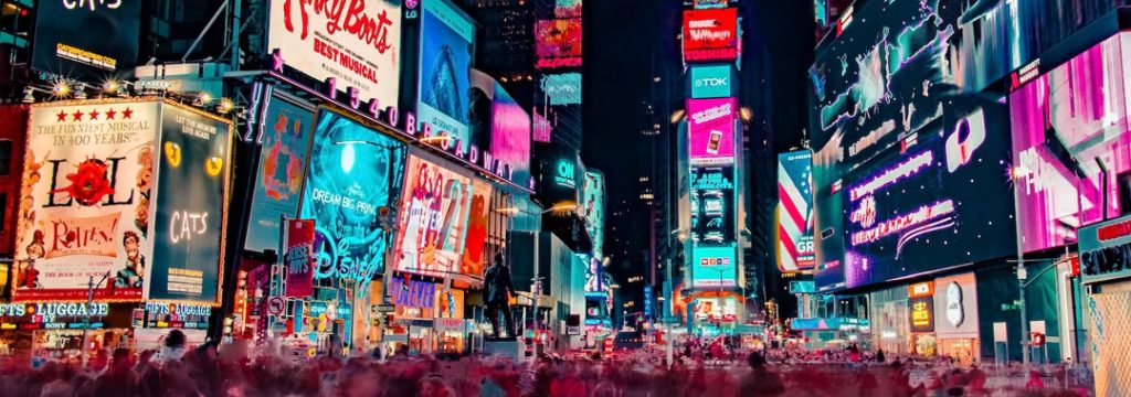 Billboards in Times Square showing importance of contextual advertising