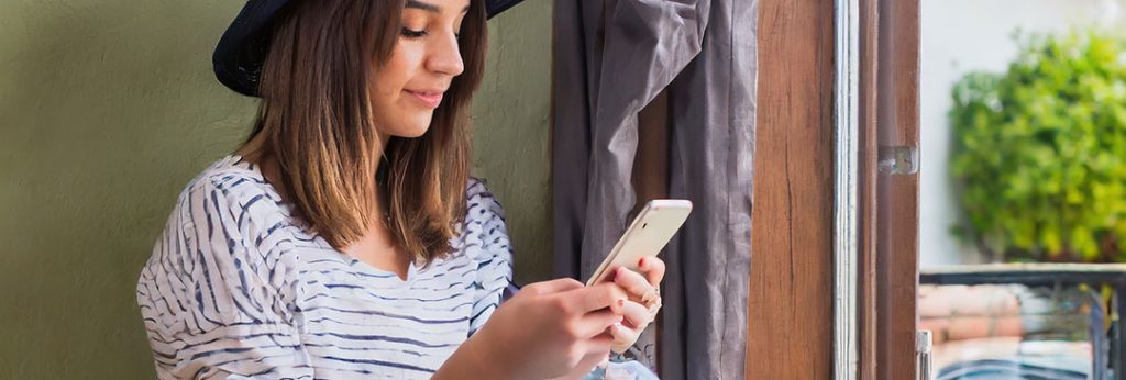 Woman engaging with phone message