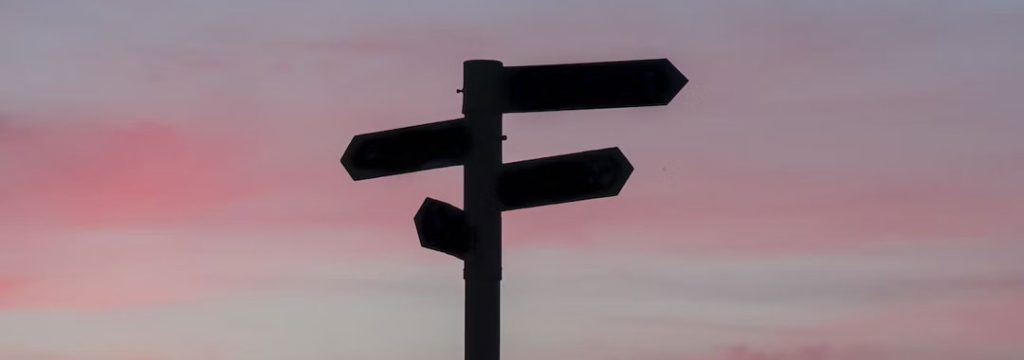 Signpost pointing in different directions